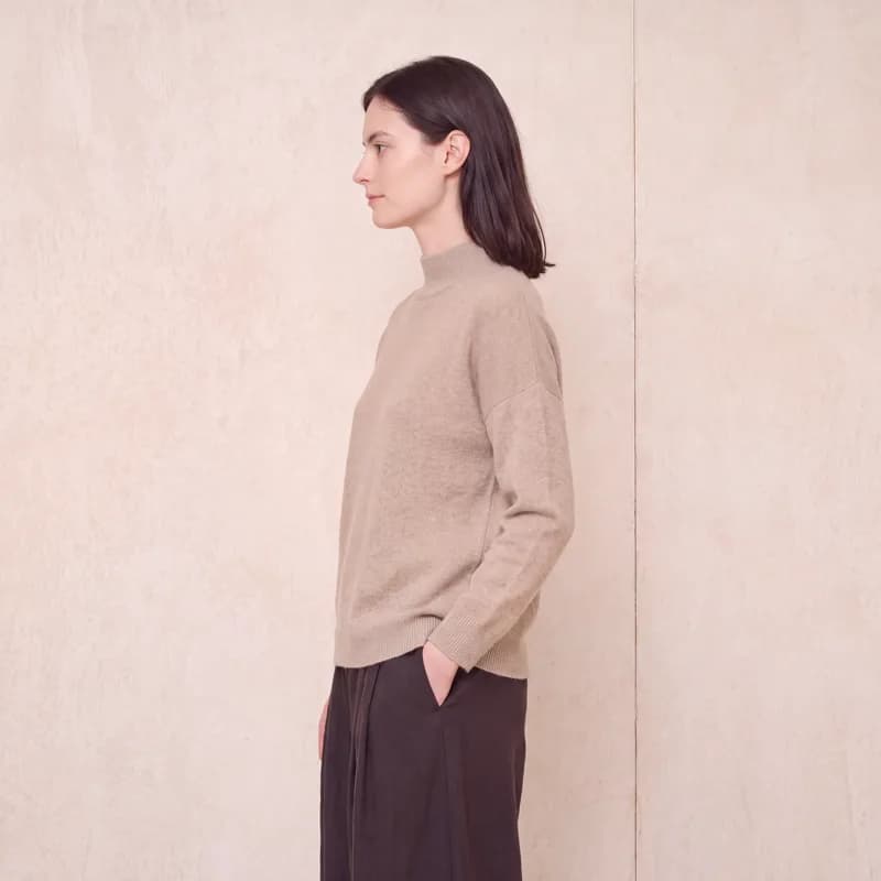 Jolene sweater on a model in a styled setting